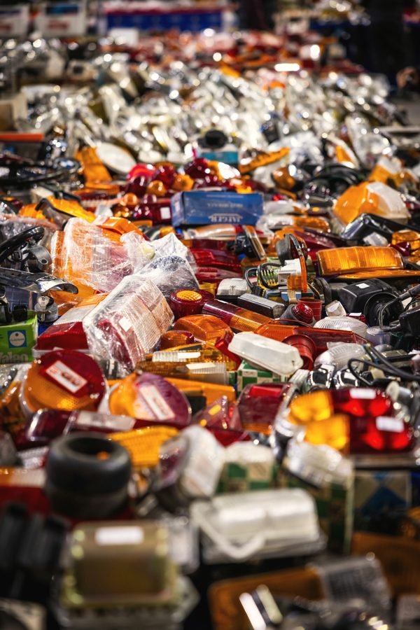 A heap of amber and red tail light lenses